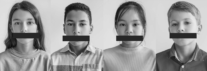 Children with their mouths taped shut